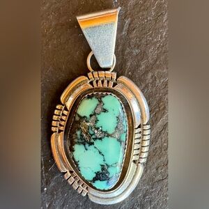 Beautiful Ray Begay turquoise pendant.